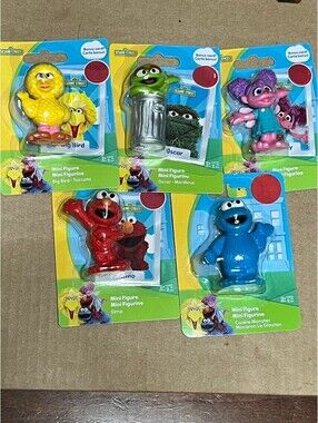 Sesame Street mini figures. Cake Topper turned perfect little hand toy